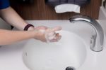 washing hands in a sink