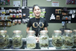 Happy cannabis female worker