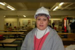 Cargill woman in hardhat stands in breakroom