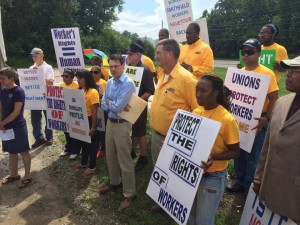 Workers, allies, and members of Local 1208 take a stand in front of the Mountaire plant in Lumber Bridge, NC on June 24, 2014.
